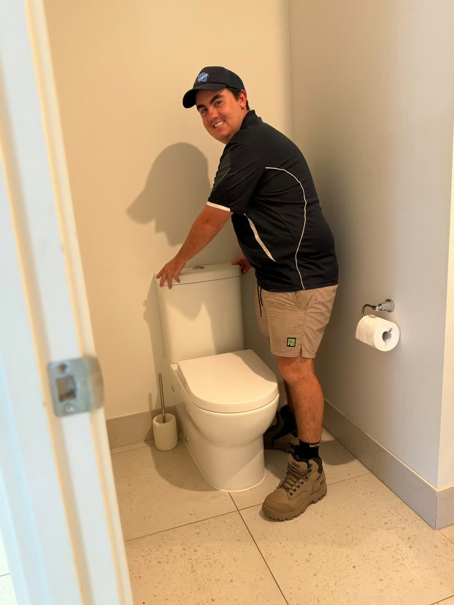 Tip Top Plumbing plumber at a kitchen sink